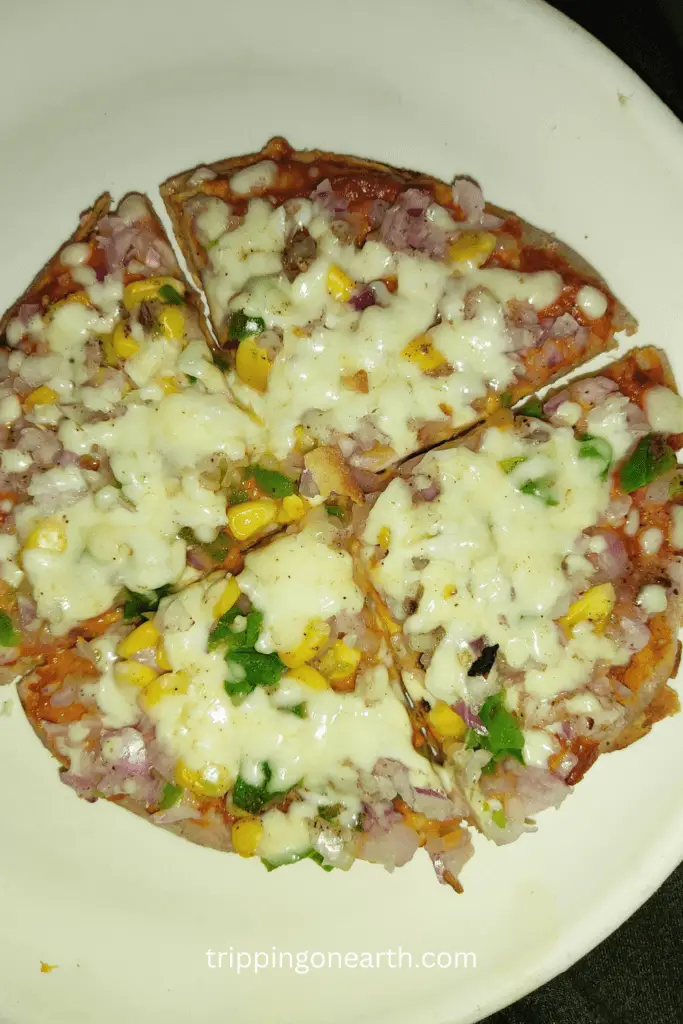 Chapati pizza served on a plate ready to eat