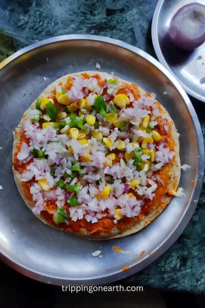 Chapati pizza preparation on the plate