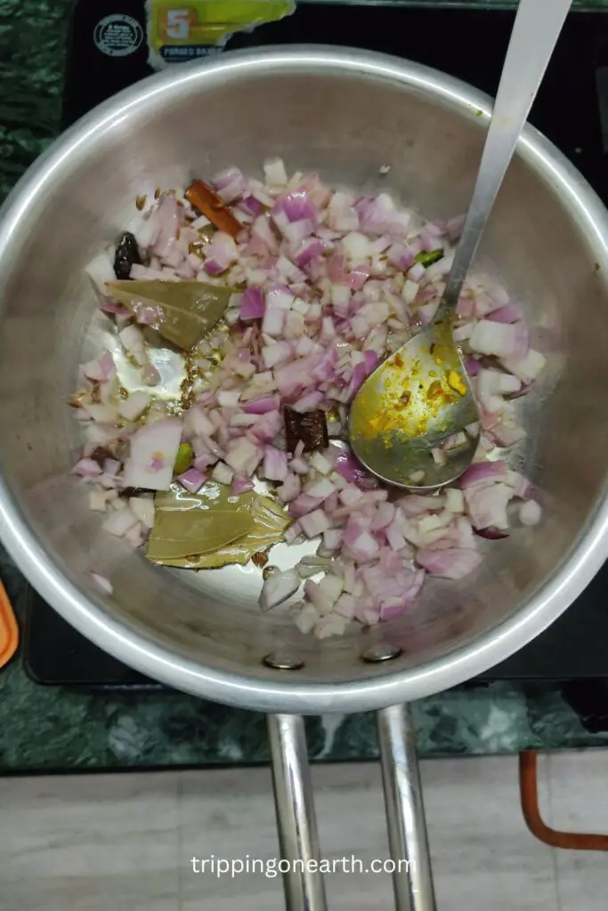 Paneer Butter Masala, add chopped onions