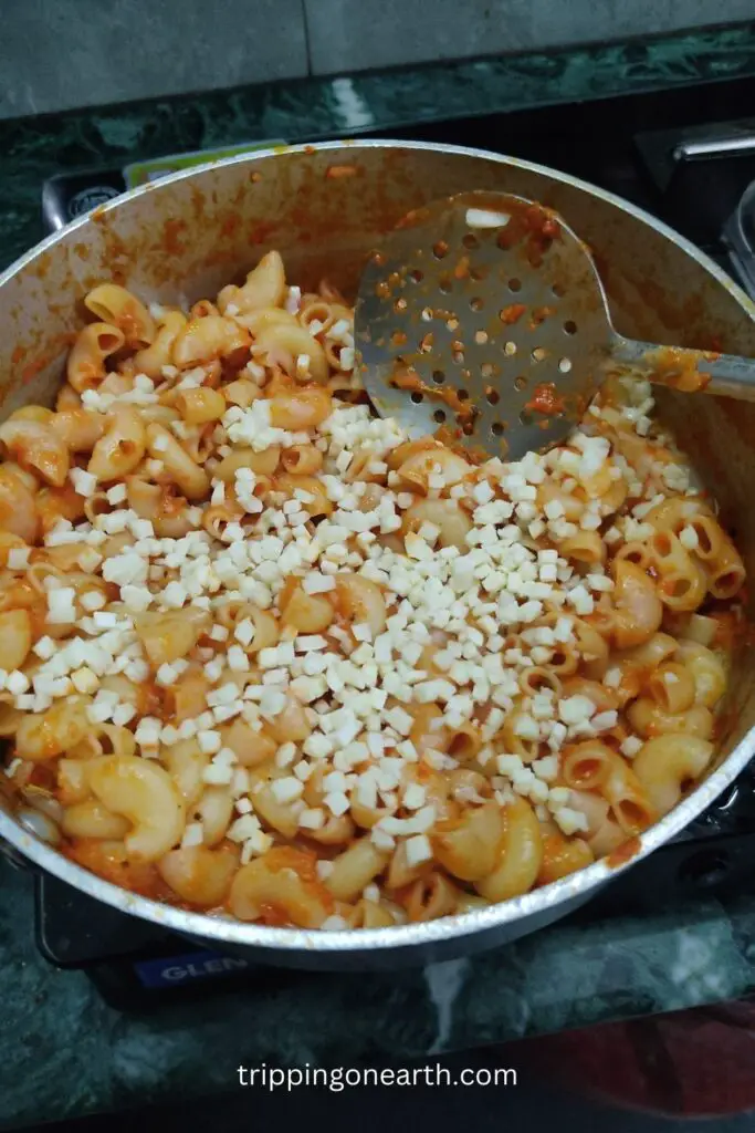 red sauce pasta, add cheese