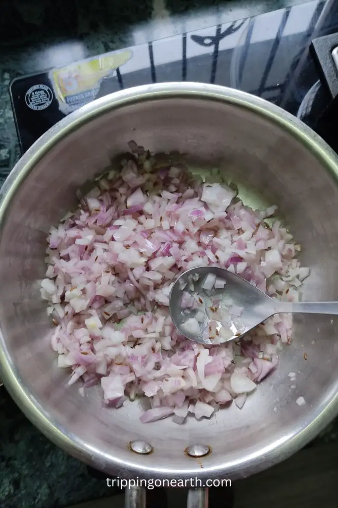 aloo bhuna, onions in the pan