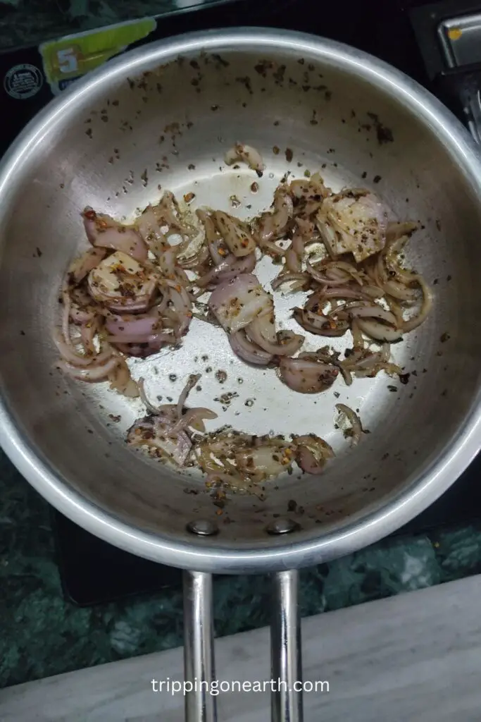 veg frankie, onions in pan