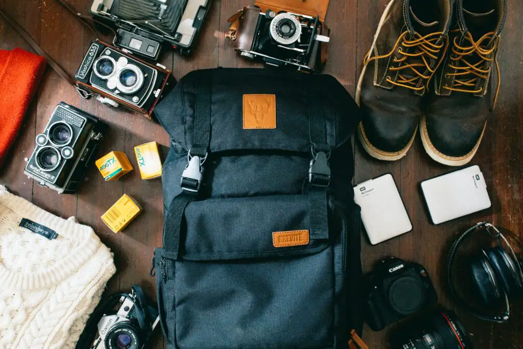 backpack, shoes, cameras