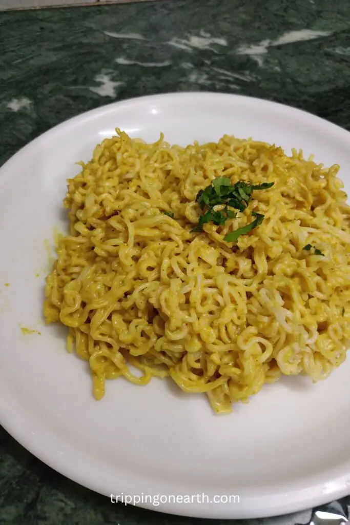 maggi white sauce pasta on a plate