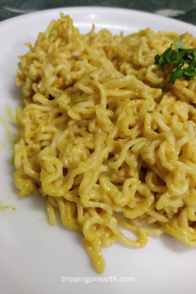 maggi white sauce pasta on a plate