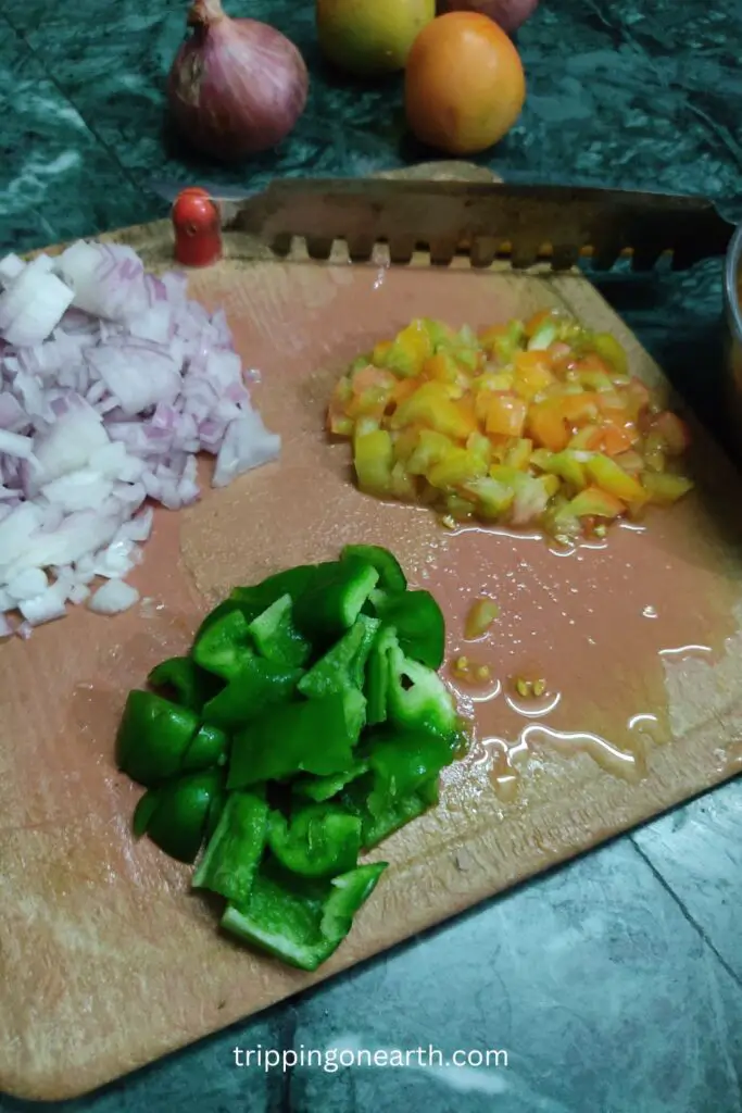 chopped onions. tomatoes, and capsicum
