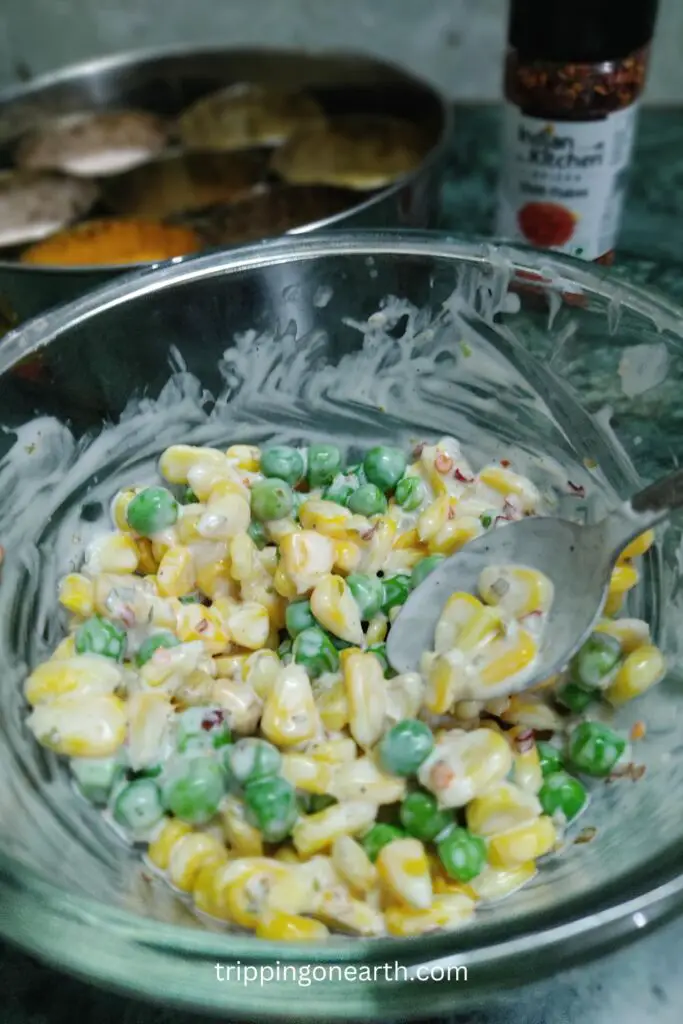 corn peas salad in a glass bowl