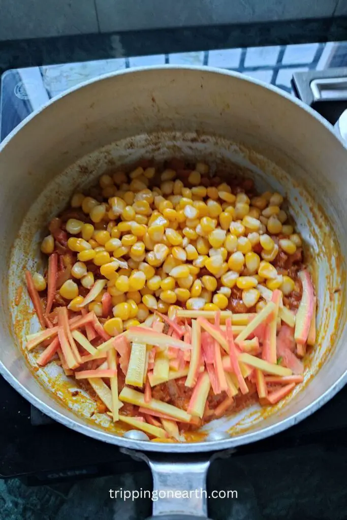 sweet corn kernels and carrots in the skillet
