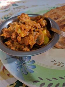 mushroom paneer in a bowl on a plate