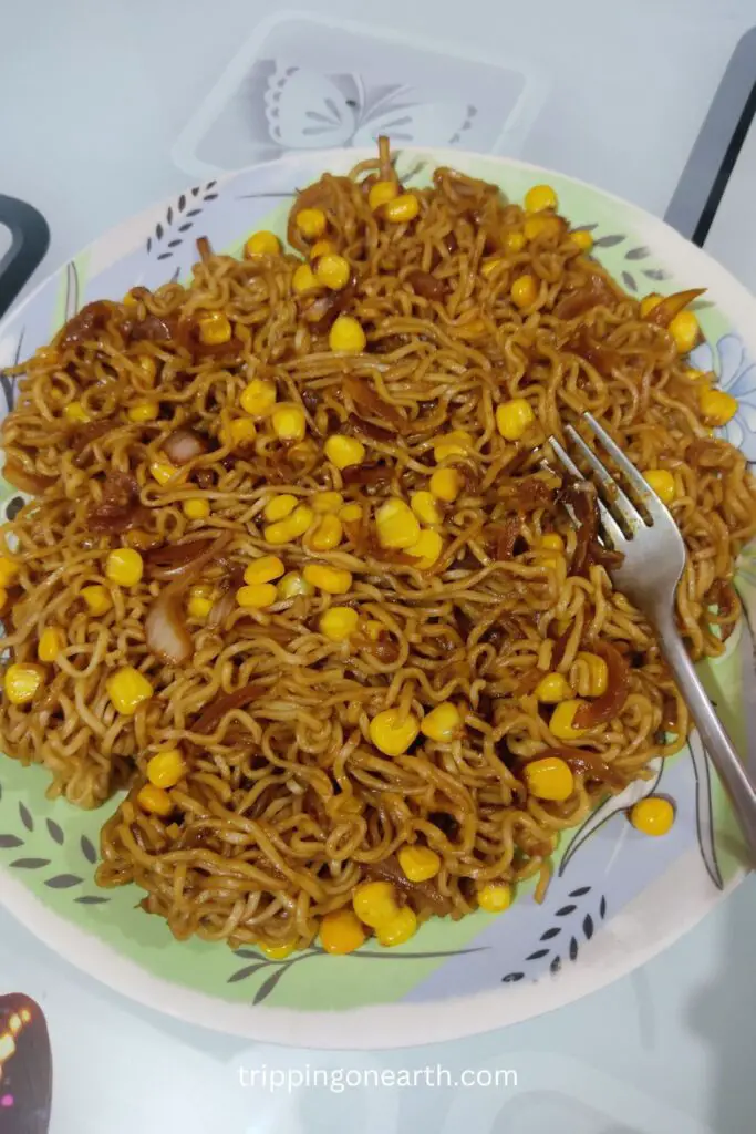 soy butter corn ramen on a plate along with a fork