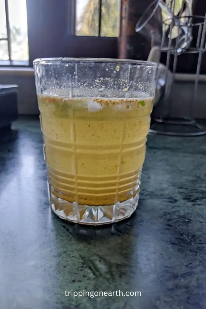 side view of masala lemonade in a glass