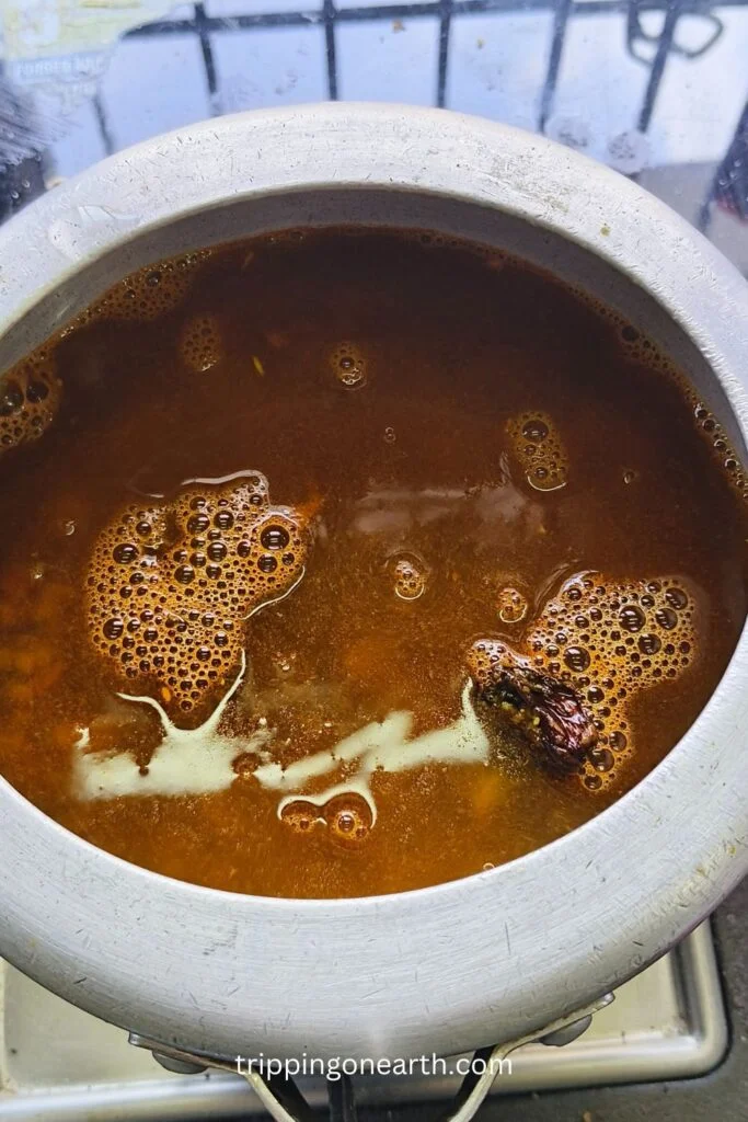 water added in the pressure cooker along with dal