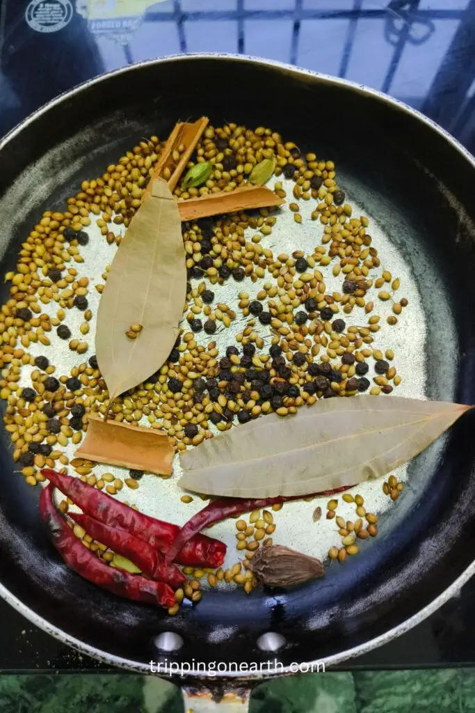 whole spices in the skillet