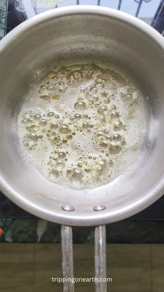 garlic being cooked in butter