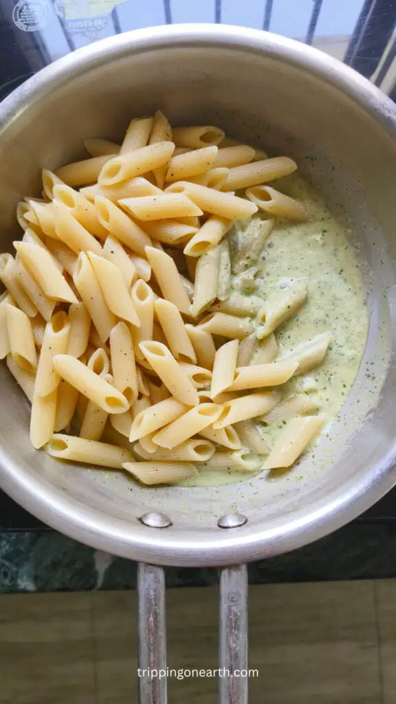 pasta and pistachio sauce in the skillet 
