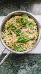 sesame brown butter udon noodles in a skillet