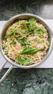sesame brown butter udon noodles in a skillet