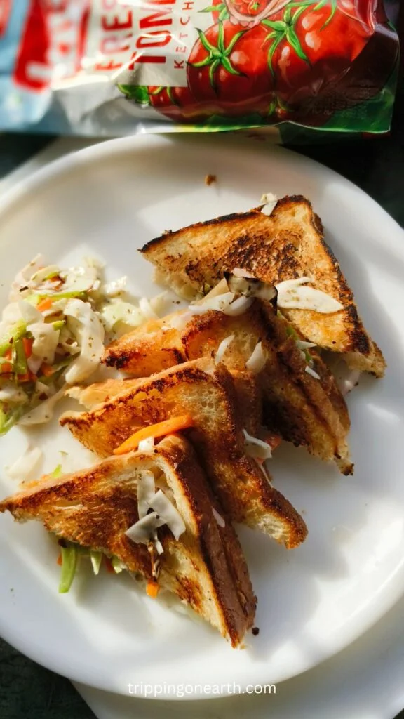 Coleslaw sandwich on a white plate