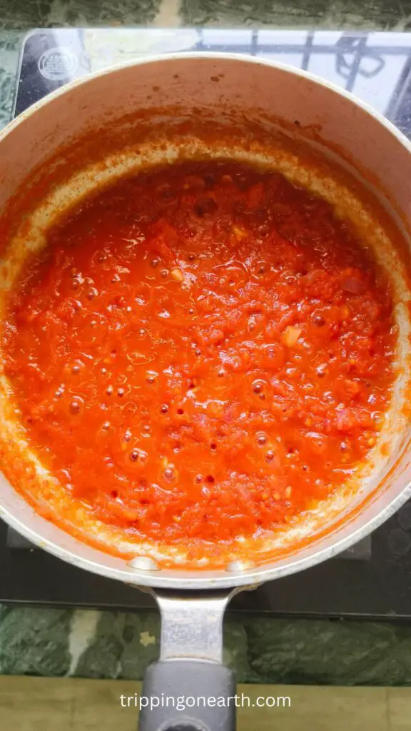 cooked tomato puree in a skillet