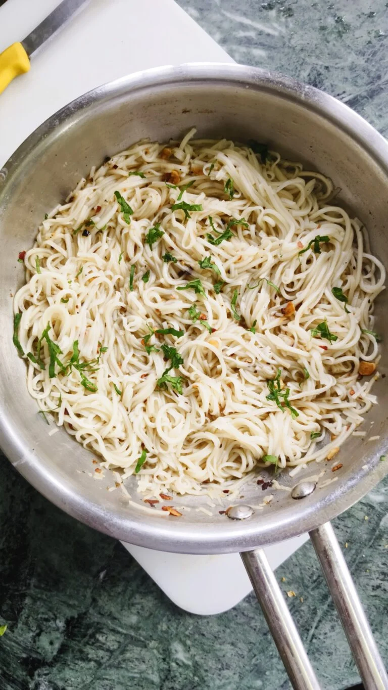 top view of garlic butter noodles in a skillet