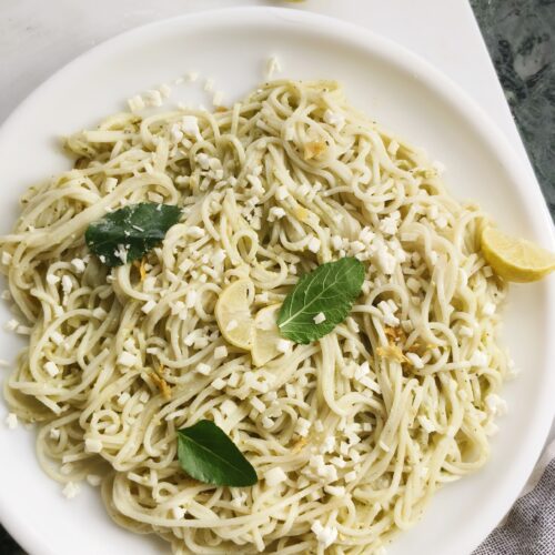 lemon pesto pasta on a white plate