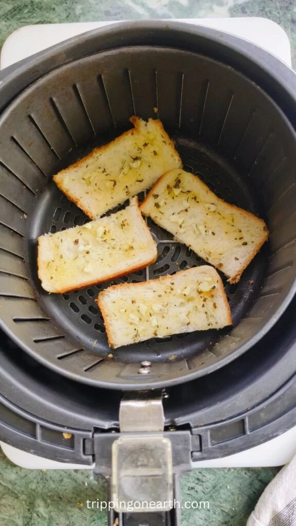 bread cut into 4 pieces and places in air fryer