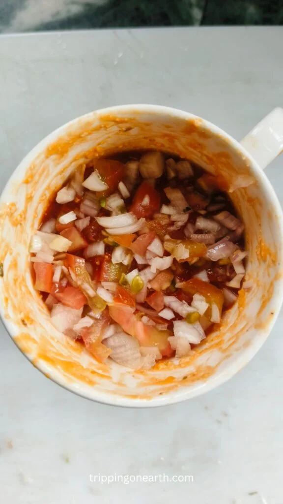 mug topped with veggies