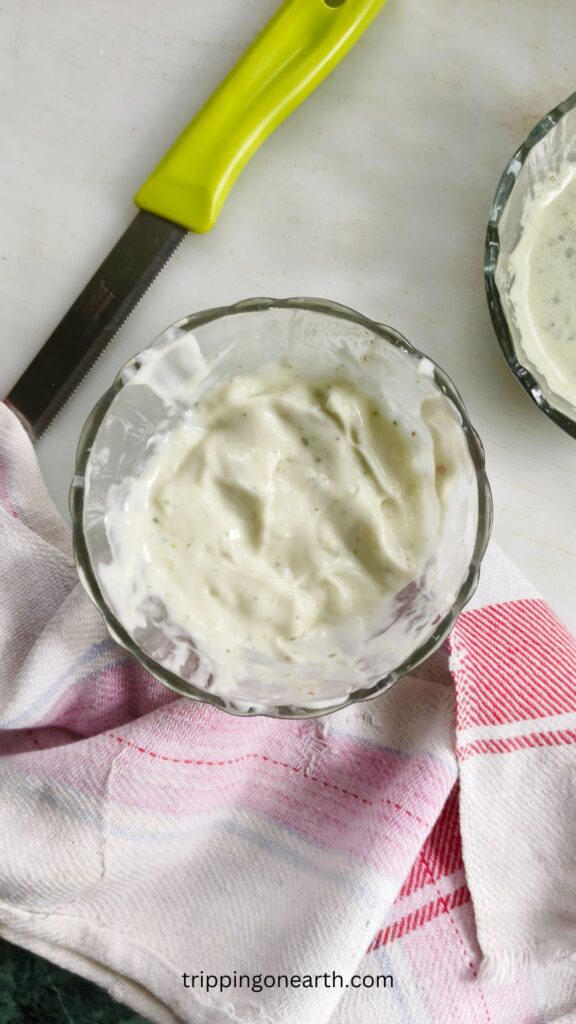 top view of pesto aioli in a glass bowl