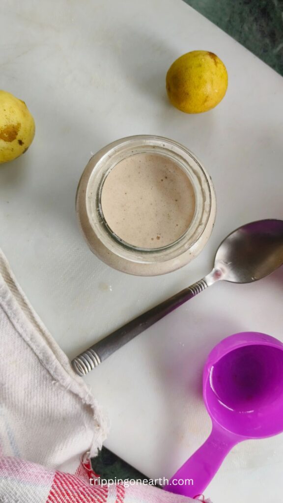 top view of apple vinaigrette in a glass jar