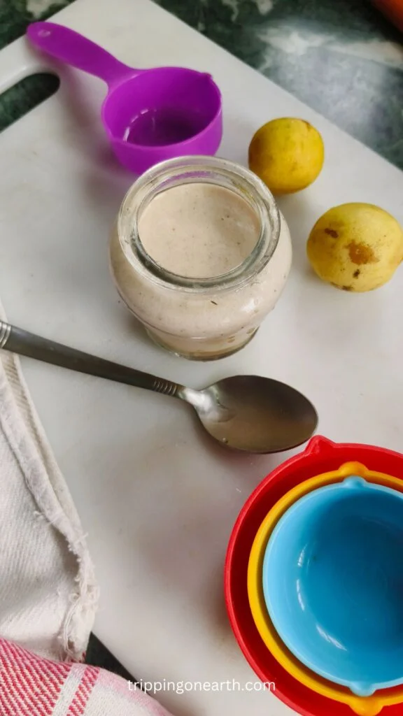 three-fourth view of apple vinaigrette in a glass jar