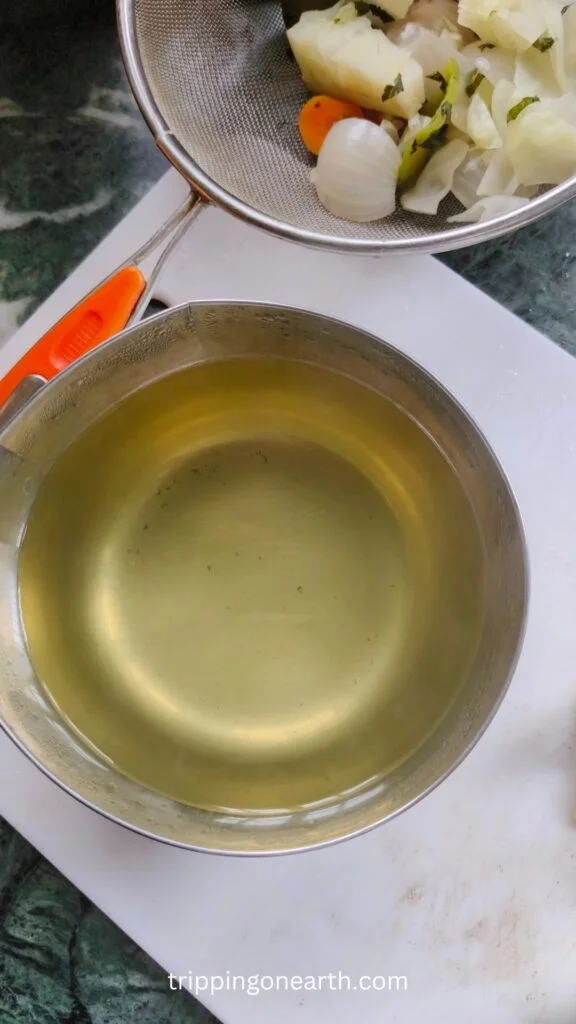 Vegetable stock and boiled veggies set separately