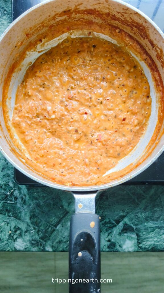 Tomato alfredo sauce in the skillet