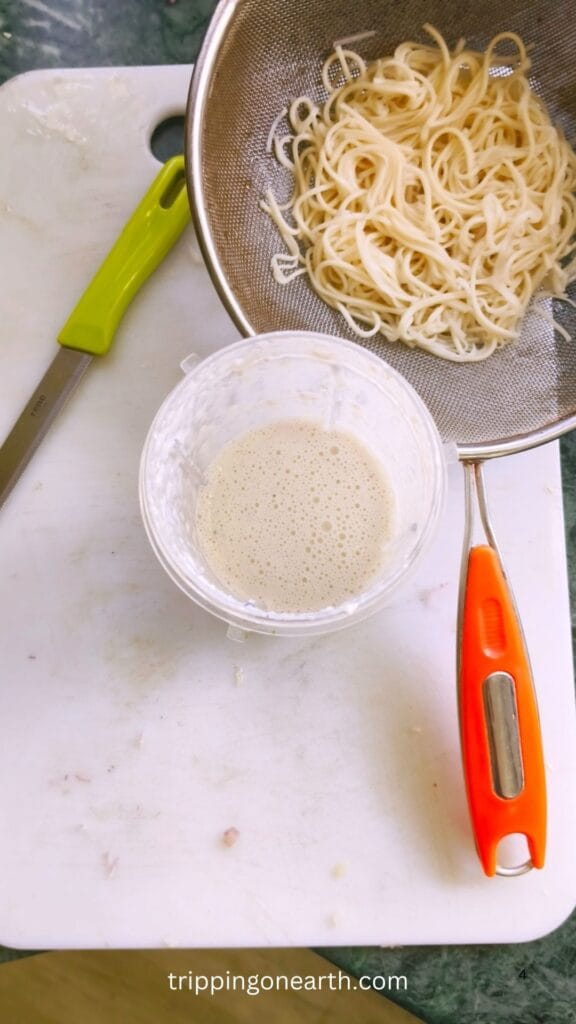 blended sauce in a jar along with cooked spaghetti