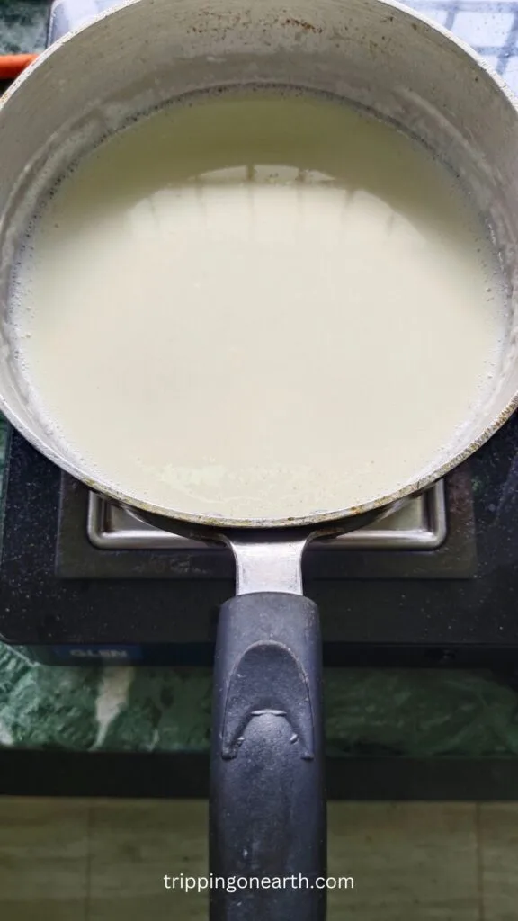 milk mixed with butter, refined flour, and garlic