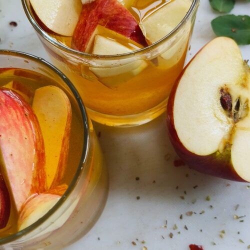 apple cider sangria in two glasses