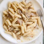 vegan mushroom stroganoff on a white plate