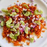 crispy rice salad on a white plate